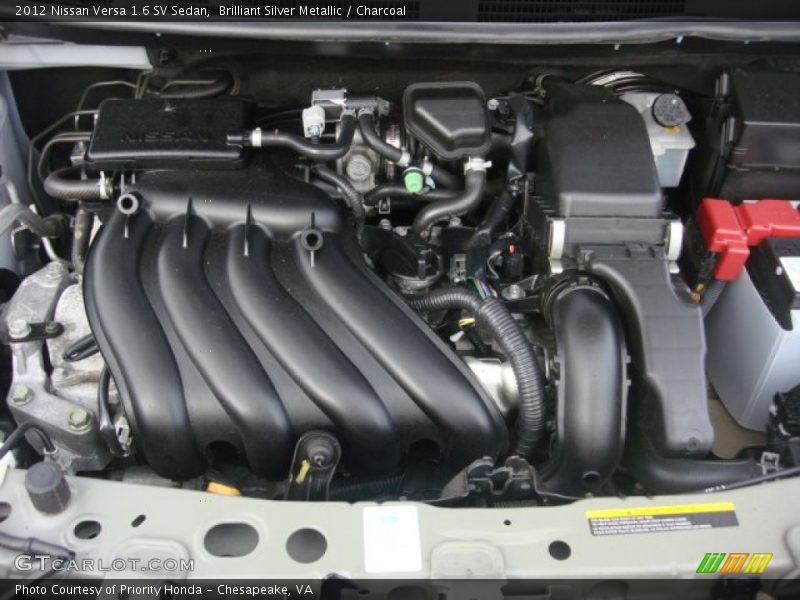 Brilliant Silver Metallic / Charcoal 2012 Nissan Versa 1.6 SV Sedan