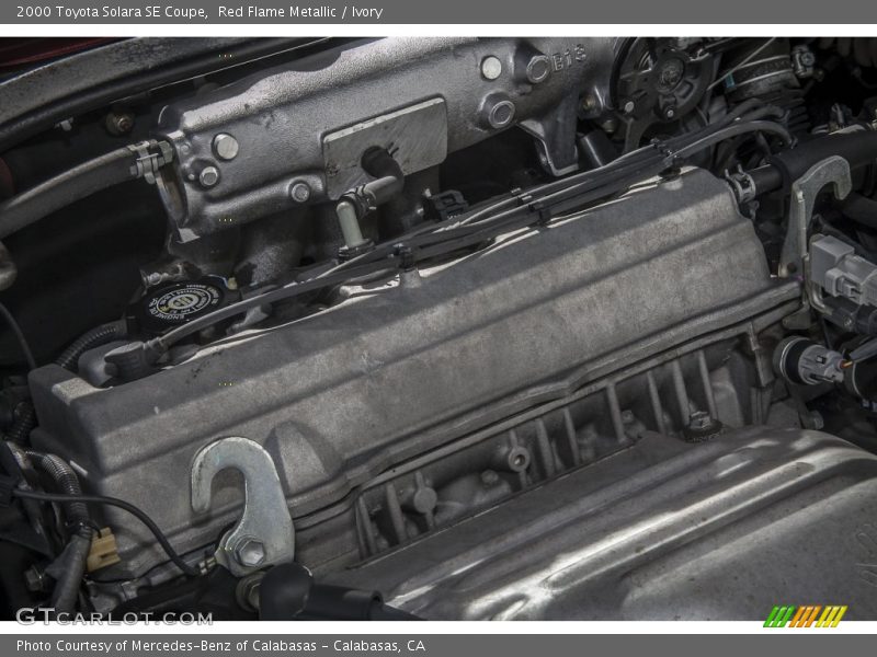 Red Flame Metallic / Ivory 2000 Toyota Solara SE Coupe