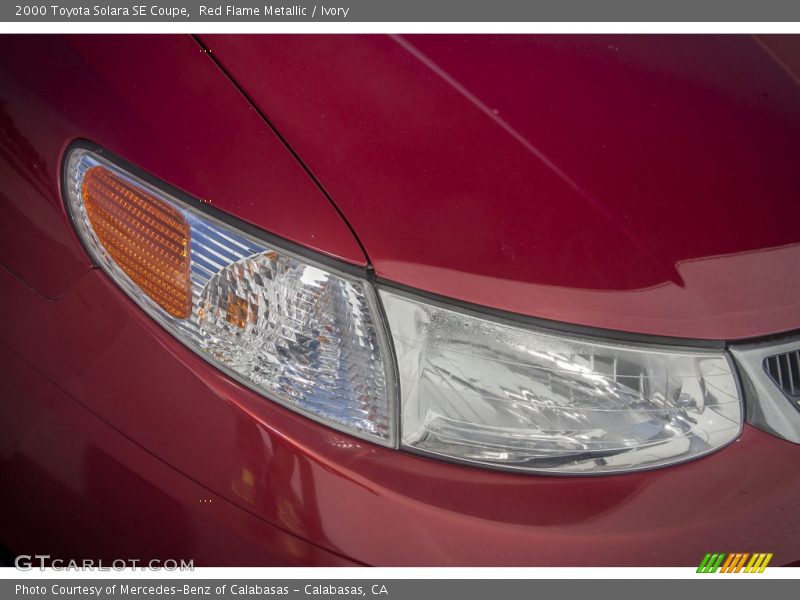 Red Flame Metallic / Ivory 2000 Toyota Solara SE Coupe