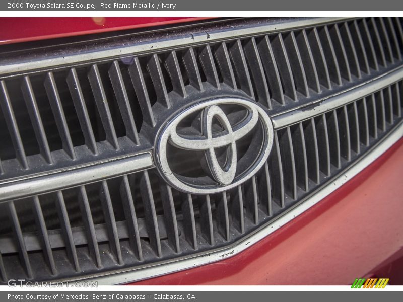 Red Flame Metallic / Ivory 2000 Toyota Solara SE Coupe