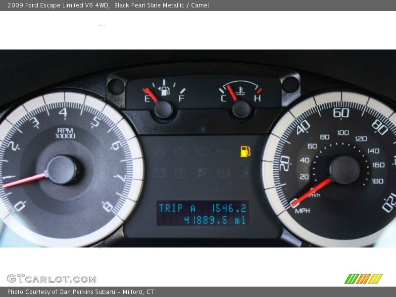 Black Pearl Slate Metallic / Camel 2009 Ford Escape Limited V6 4WD