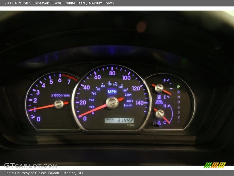 White Pearl / Medium Brown 2011 Mitsubishi Endeavor SE AWD