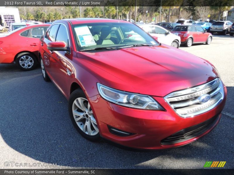 Red Candy Metallic / Light Stone 2012 Ford Taurus SEL