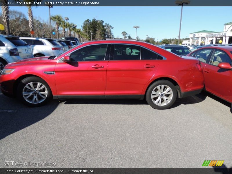Red Candy Metallic / Light Stone 2012 Ford Taurus SEL