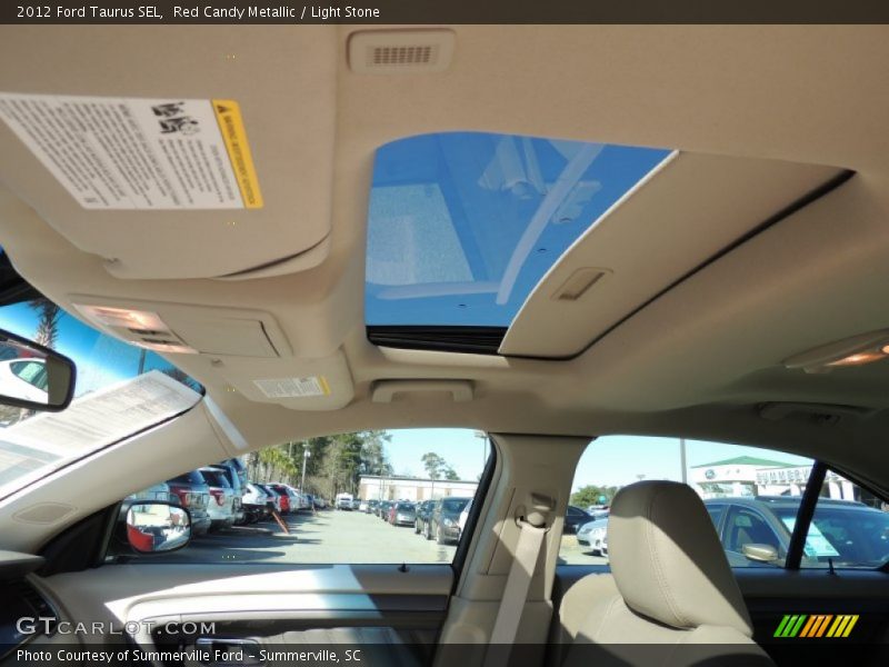 Red Candy Metallic / Light Stone 2012 Ford Taurus SEL