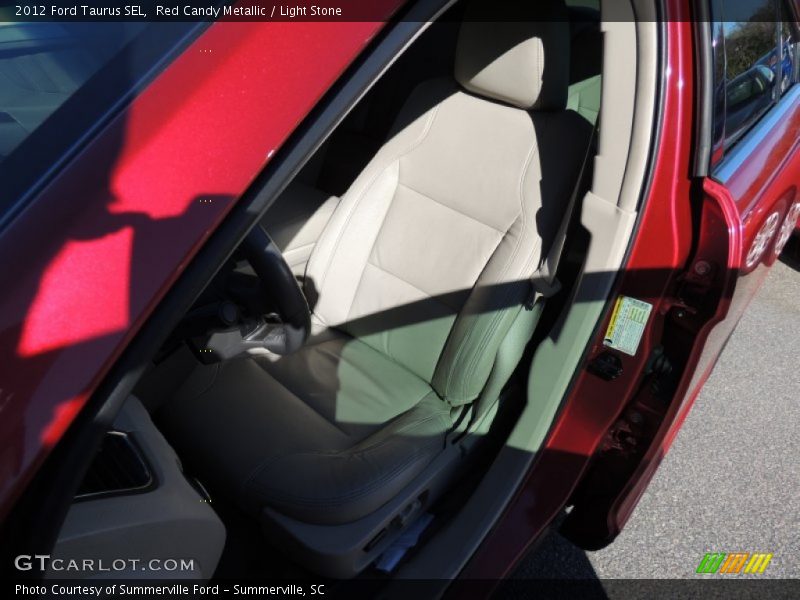 Red Candy Metallic / Light Stone 2012 Ford Taurus SEL