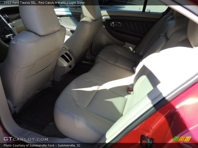 Red Candy Metallic / Light Stone 2012 Ford Taurus SEL
