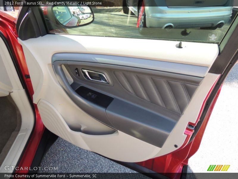 Red Candy Metallic / Light Stone 2012 Ford Taurus SEL