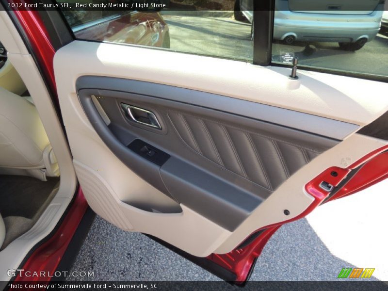 Red Candy Metallic / Light Stone 2012 Ford Taurus SEL