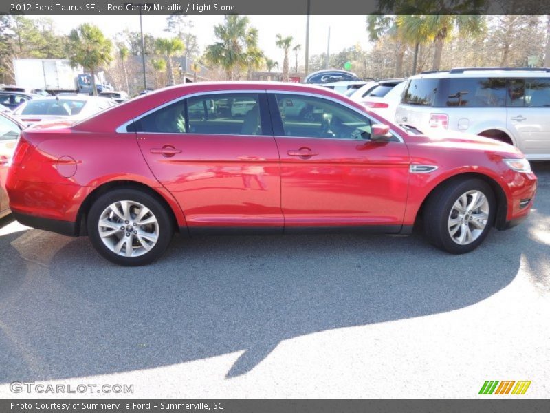 Red Candy Metallic / Light Stone 2012 Ford Taurus SEL