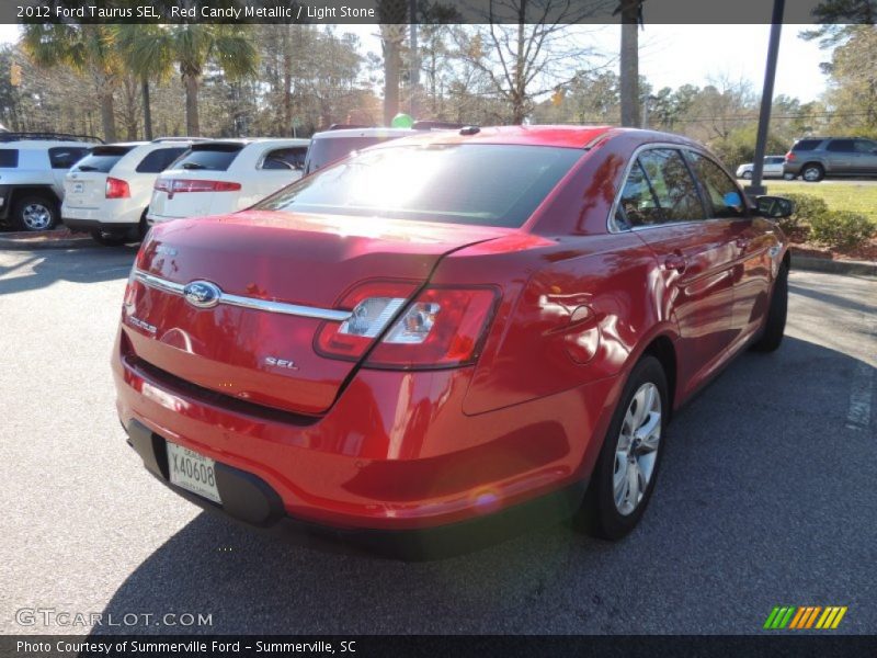 Red Candy Metallic / Light Stone 2012 Ford Taurus SEL