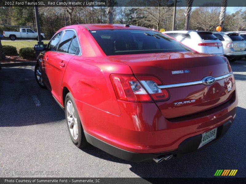 Red Candy Metallic / Light Stone 2012 Ford Taurus SEL