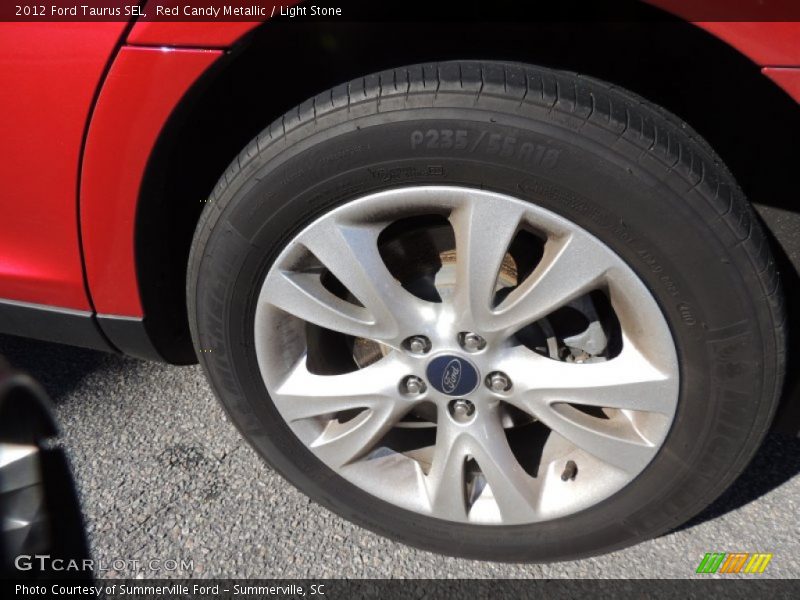 Red Candy Metallic / Light Stone 2012 Ford Taurus SEL