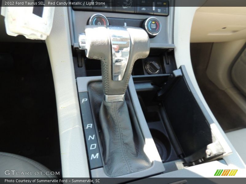 Red Candy Metallic / Light Stone 2012 Ford Taurus SEL