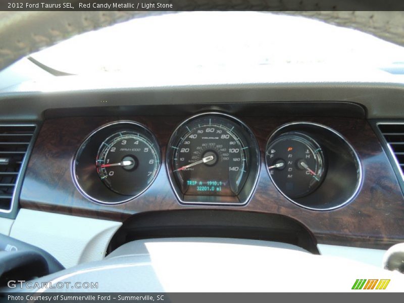 Red Candy Metallic / Light Stone 2012 Ford Taurus SEL