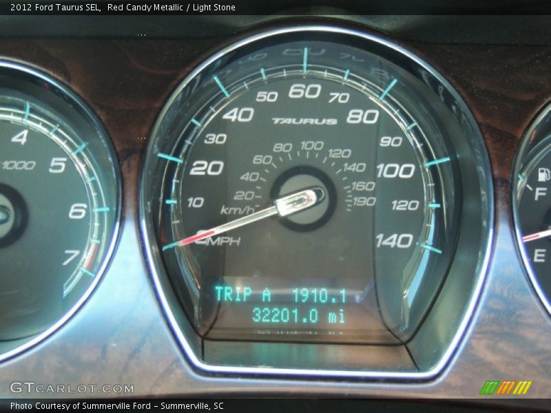 Red Candy Metallic / Light Stone 2012 Ford Taurus SEL
