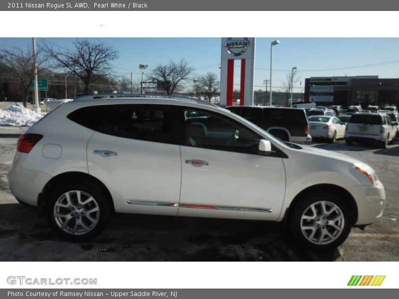 Pearl White / Black 2011 Nissan Rogue SL AWD
