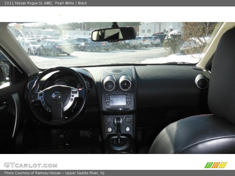 Pearl White / Black 2011 Nissan Rogue SL AWD