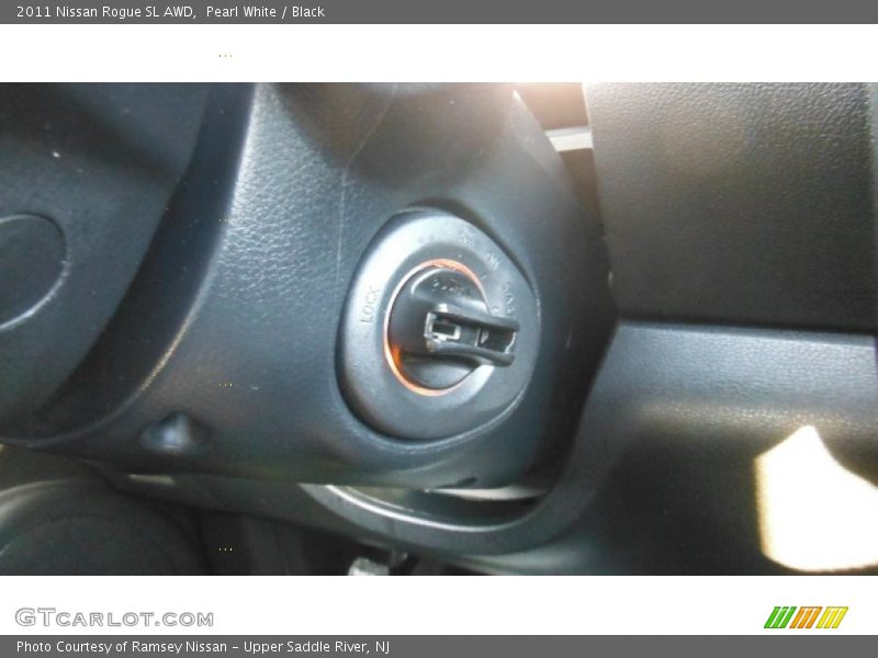 Pearl White / Black 2011 Nissan Rogue SL AWD
