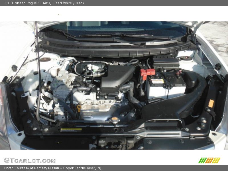 Pearl White / Black 2011 Nissan Rogue SL AWD