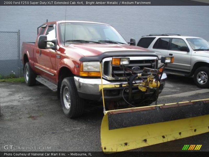 Bright Amber Metallic / Medium Parchment 2000 Ford F250 Super Duty XLT Extended Cab 4x4