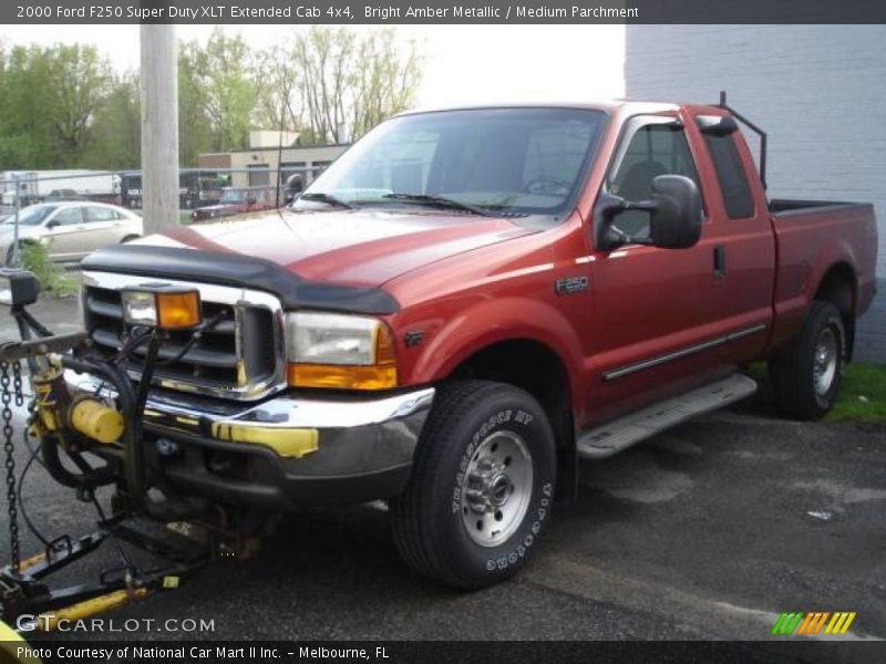 Bright Amber Metallic / Medium Parchment 2000 Ford F250 Super Duty XLT Extended Cab 4x4