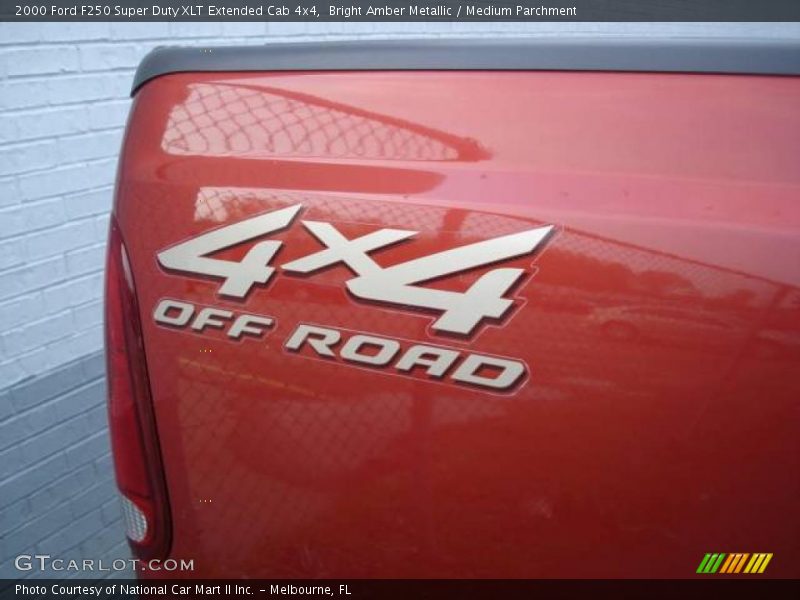 Bright Amber Metallic / Medium Parchment 2000 Ford F250 Super Duty XLT Extended Cab 4x4