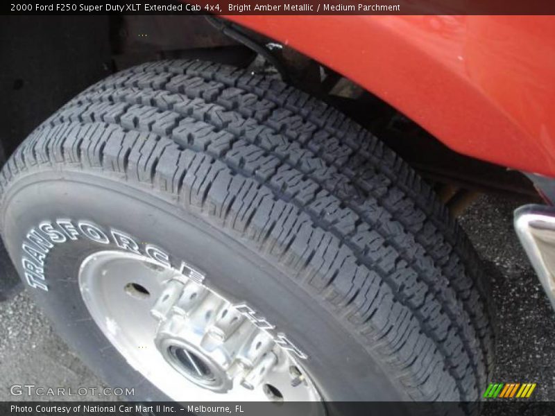 Bright Amber Metallic / Medium Parchment 2000 Ford F250 Super Duty XLT Extended Cab 4x4