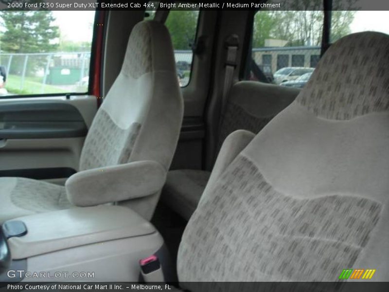 Bright Amber Metallic / Medium Parchment 2000 Ford F250 Super Duty XLT Extended Cab 4x4