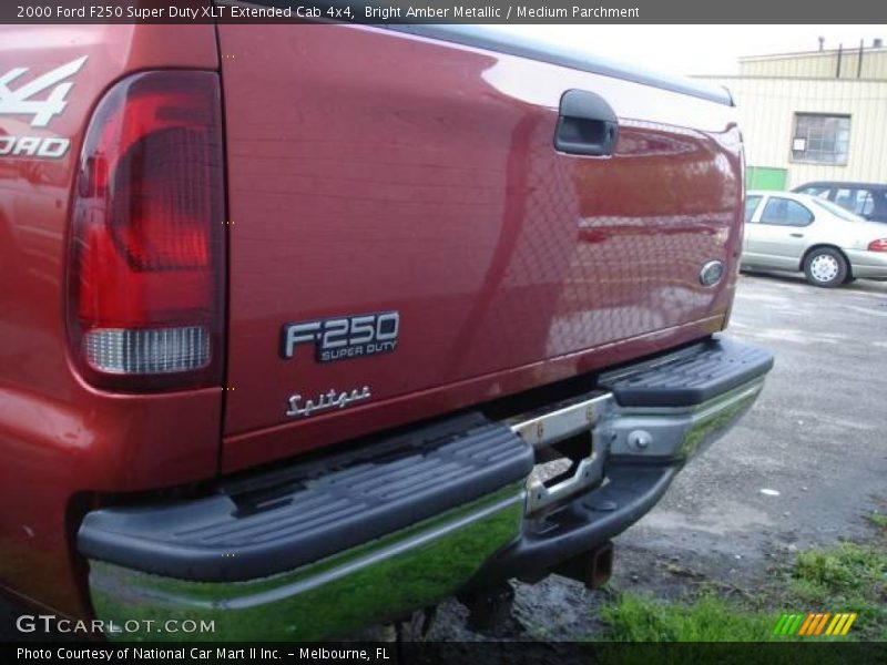 Bright Amber Metallic / Medium Parchment 2000 Ford F250 Super Duty XLT Extended Cab 4x4