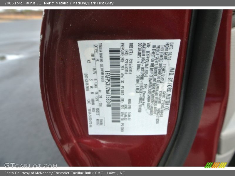 Merlot Metallic / Medium/Dark Flint Grey 2006 Ford Taurus SE