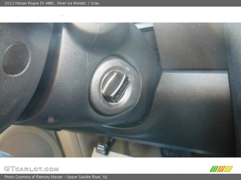 Silver Ice Metallic / Gray 2011 Nissan Rogue SV AWD