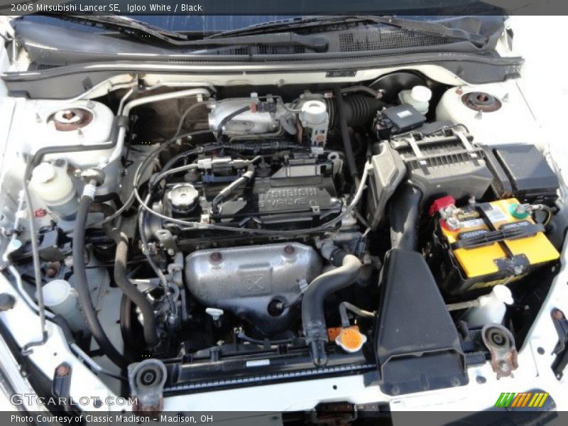 Igloo White / Black 2006 Mitsubishi Lancer SE