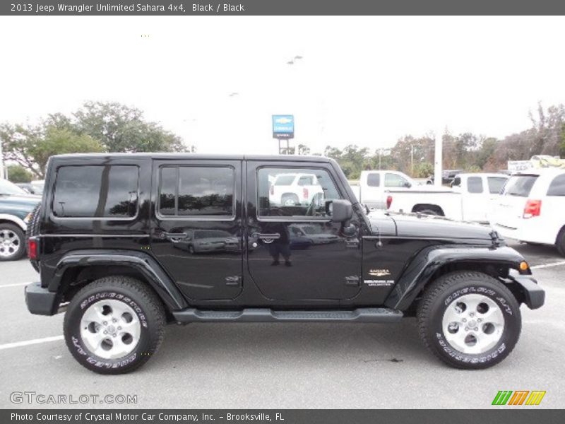 Black / Black 2013 Jeep Wrangler Unlimited Sahara 4x4