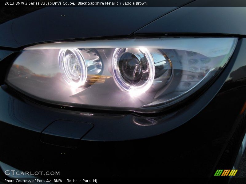 Black Sapphire Metallic / Saddle Brown 2013 BMW 3 Series 335i xDrive Coupe