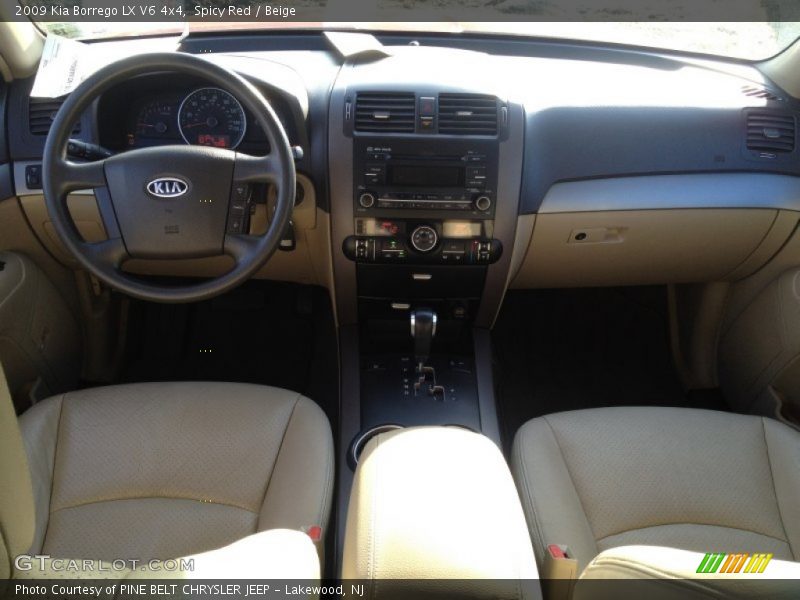 Spicy Red / Beige 2009 Kia Borrego LX V6 4x4