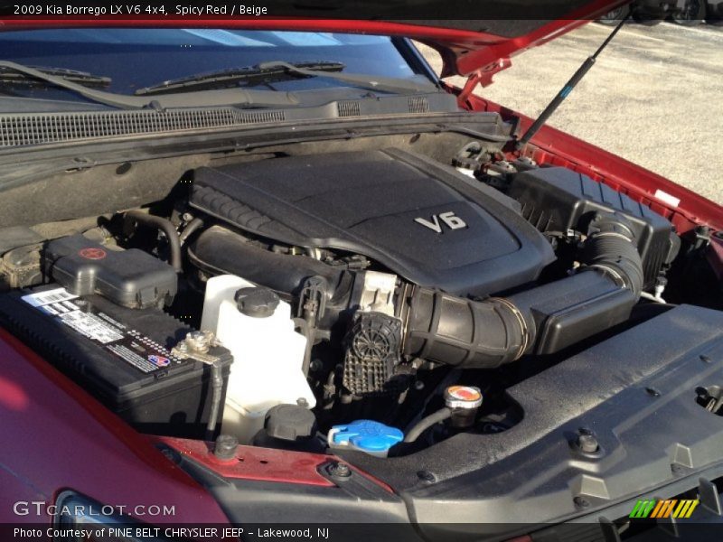 Spicy Red / Beige 2009 Kia Borrego LX V6 4x4