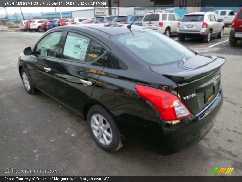 Super Black / Charcoal 2014 Nissan Versa 1.6 SV Sedan