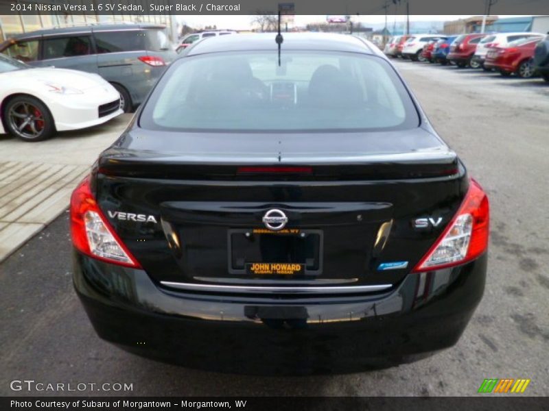Super Black / Charcoal 2014 Nissan Versa 1.6 SV Sedan