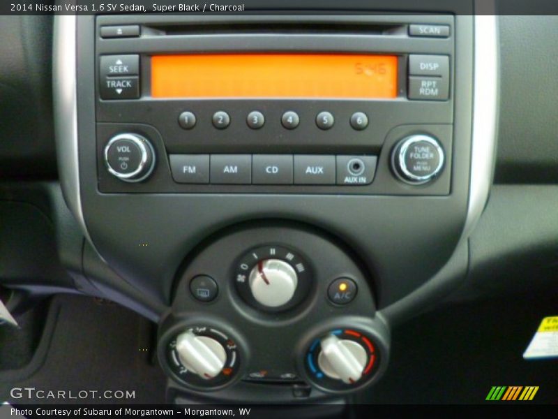 Super Black / Charcoal 2014 Nissan Versa 1.6 SV Sedan