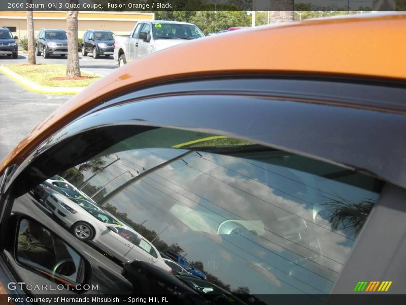 Fusion Orange / Black 2006 Saturn ION 3 Quad Coupe