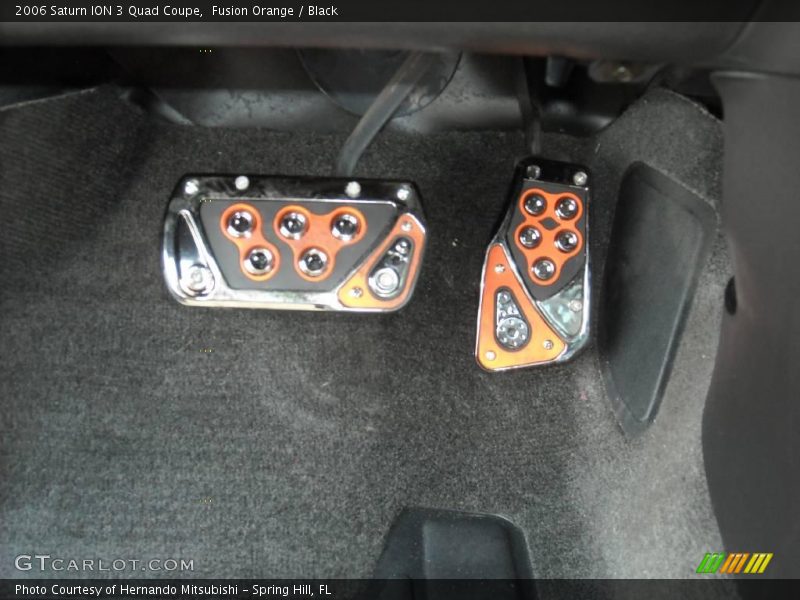 Fusion Orange / Black 2006 Saturn ION 3 Quad Coupe