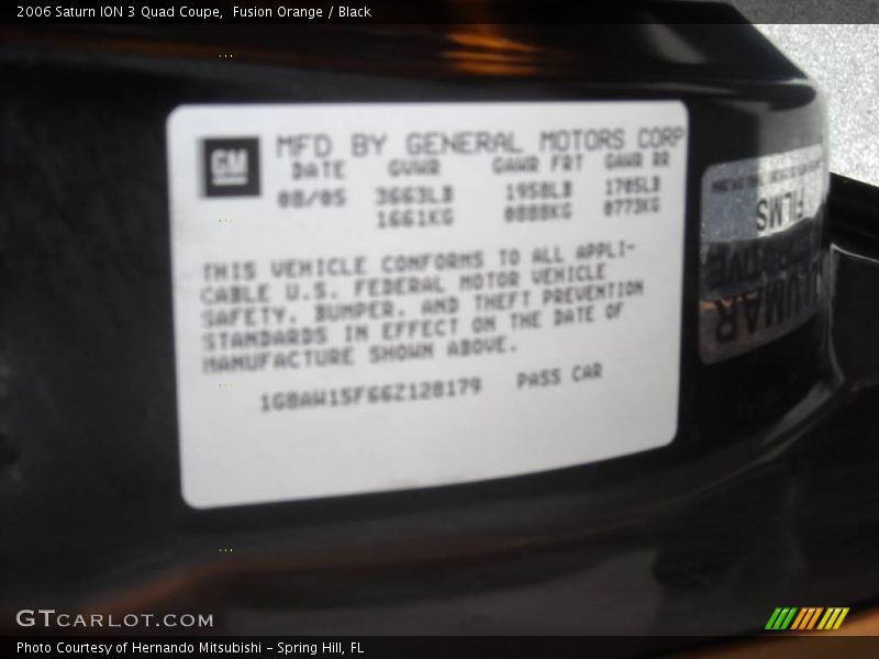 Fusion Orange / Black 2006 Saturn ION 3 Quad Coupe