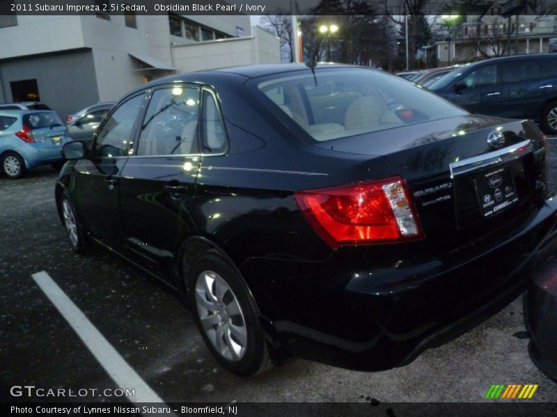 Obsidian Black Pearl / Ivory 2011 Subaru Impreza 2.5i Sedan