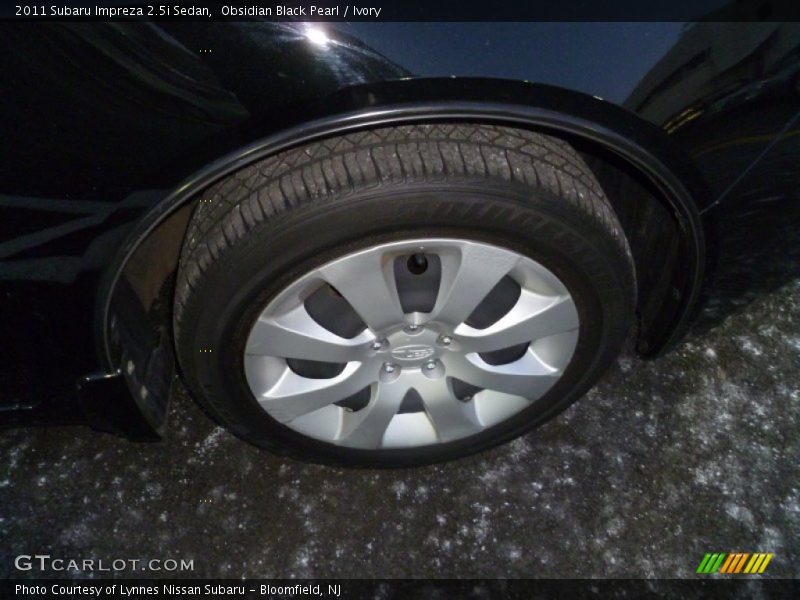 Obsidian Black Pearl / Ivory 2011 Subaru Impreza 2.5i Sedan