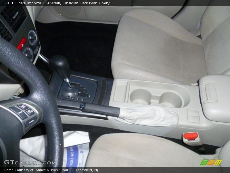 Obsidian Black Pearl / Ivory 2011 Subaru Impreza 2.5i Sedan