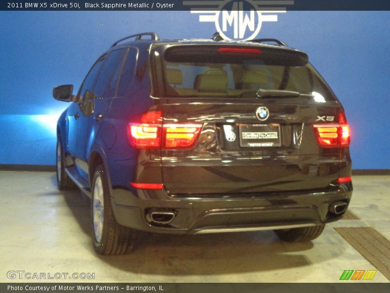 Black Sapphire Metallic / Oyster 2011 BMW X5 xDrive 50i