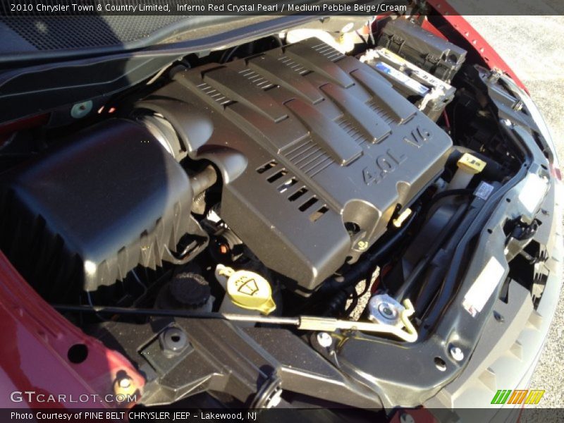 Inferno Red Crystal Pearl / Medium Pebble Beige/Cream 2010 Chrysler Town & Country Limited