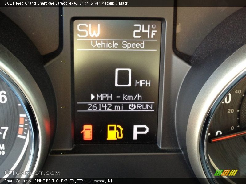 Bright Silver Metallic / Black 2011 Jeep Grand Cherokee Laredo 4x4