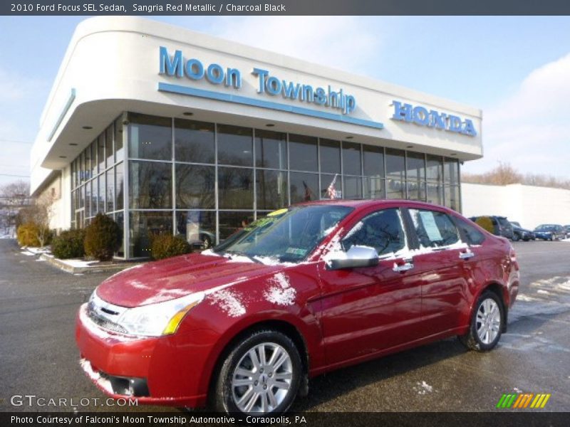 Sangria Red Metallic / Charcoal Black 2010 Ford Focus SEL Sedan